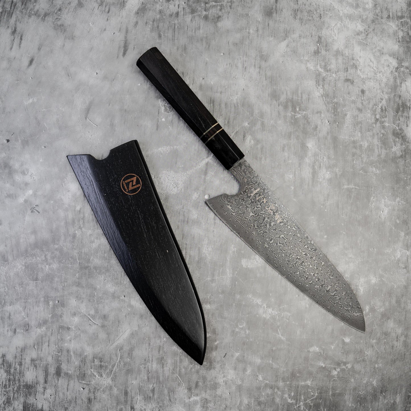 Noseto 110 层大马士革超级钢 Gyuto 黑色磨刀石和乌木八角形手柄