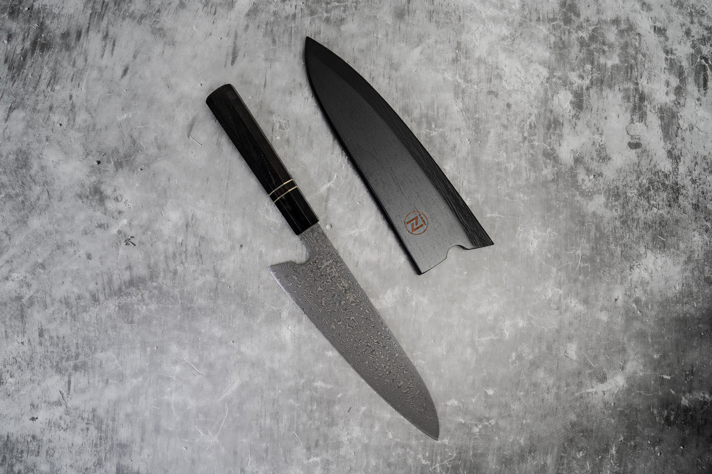 Noseto 110 层大马士革超级钢 Gyuto 黑色磨刀石和乌木八角形手柄