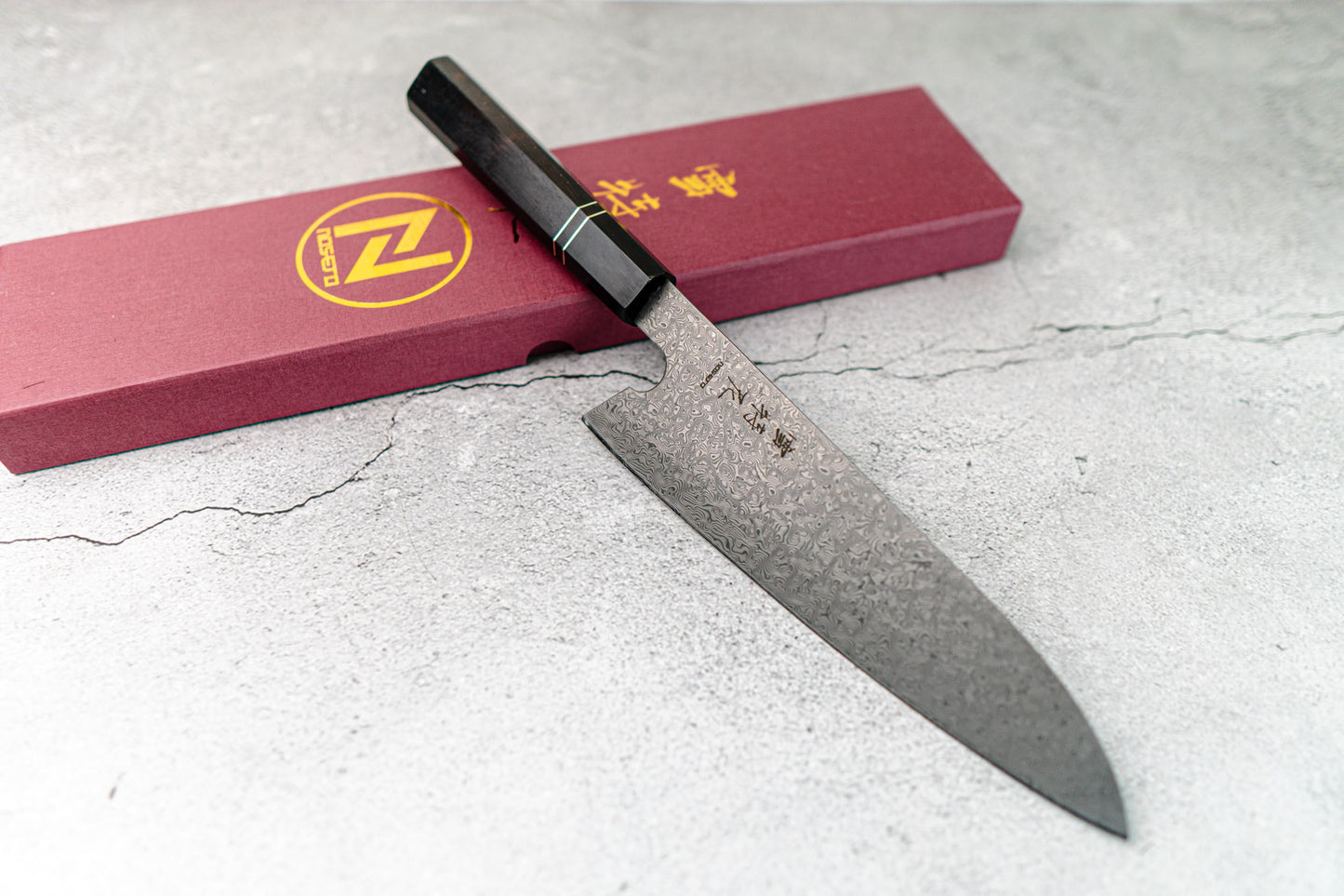Noseto 110 层大马士革超级钢 Gyuto 黑色磨刀石和乌木八角形手柄