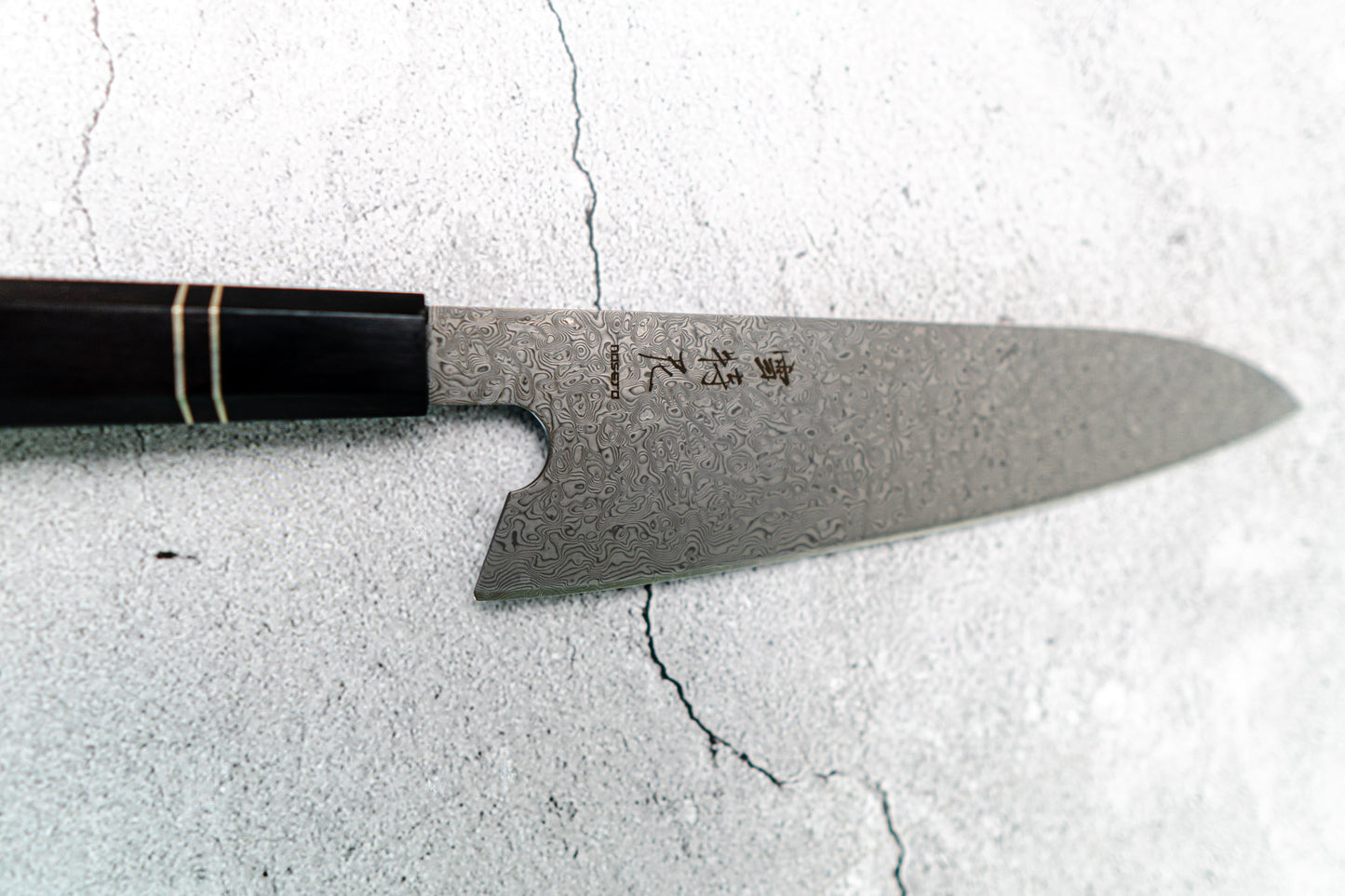 Noseto 110 层大马士革超级钢 Gyuto 黑色磨刀石和乌木八角形手柄