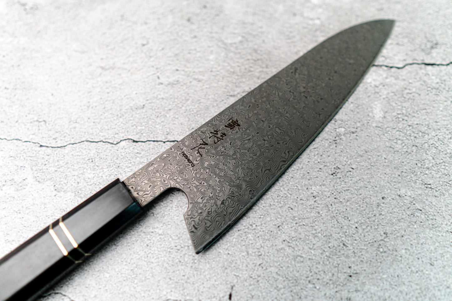 Noseto 110 层大马士革超级钢 Gyuto 黑色磨刀石和乌木八角形手柄