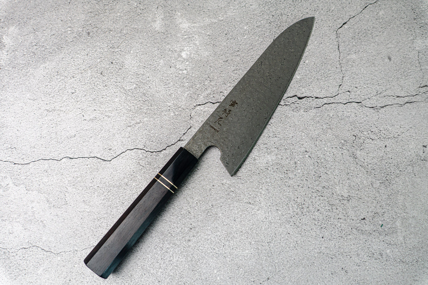 Noseto 110 层大马士革超级钢 Gyuto 黑色磨刀石和乌木八角形手柄