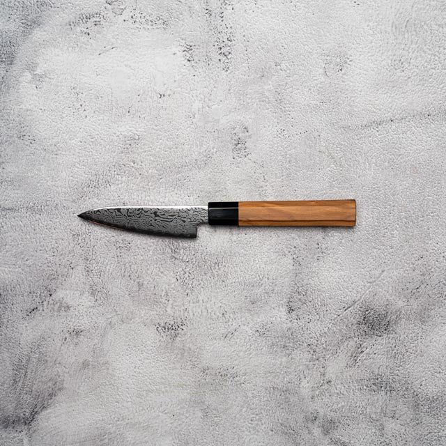 Couteau à éplucher Noseto Nato 105 mm 67 couches Damas avec bois d'olivier et corne de buffle