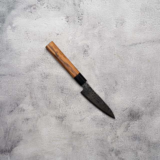 Couteau à éplucher Noseto Nato 105 mm 67 couches Damas avec bois d'olivier et corne de buffle