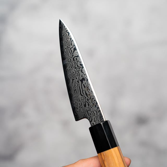 Couteau à éplucher Noseto Nato 105 mm 67 couches Damas avec bois d'olivier et corne de buffle